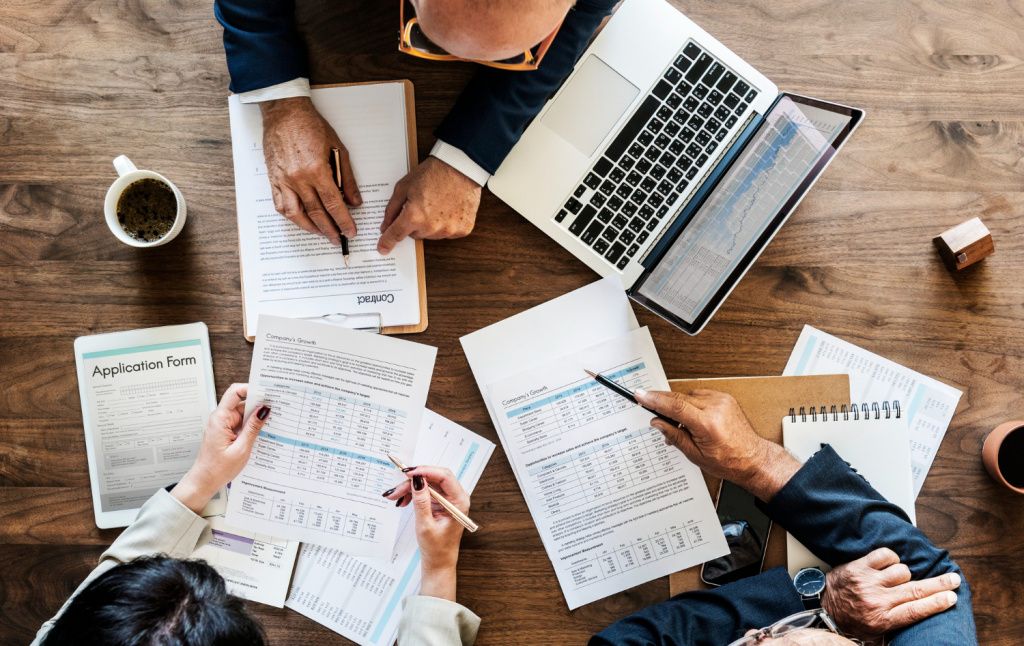 group-of-business-people-having-a-meeting.jpg